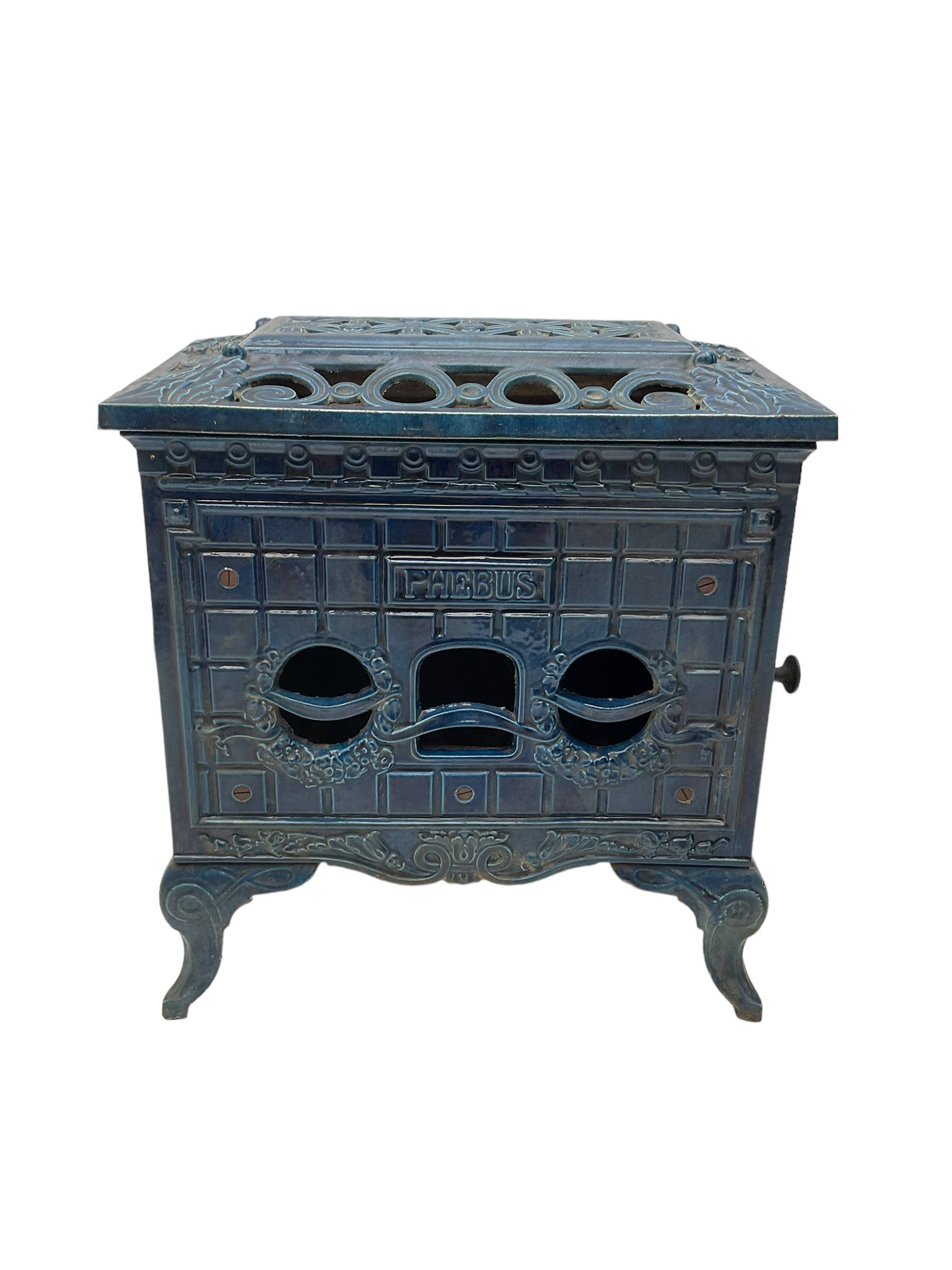 Poeles Nanquette - Art Deco 'Phebus' French enamel wood burning stove, indigo colour with pierced scrollwork decoration and acanthus leaves, on cabriole supports