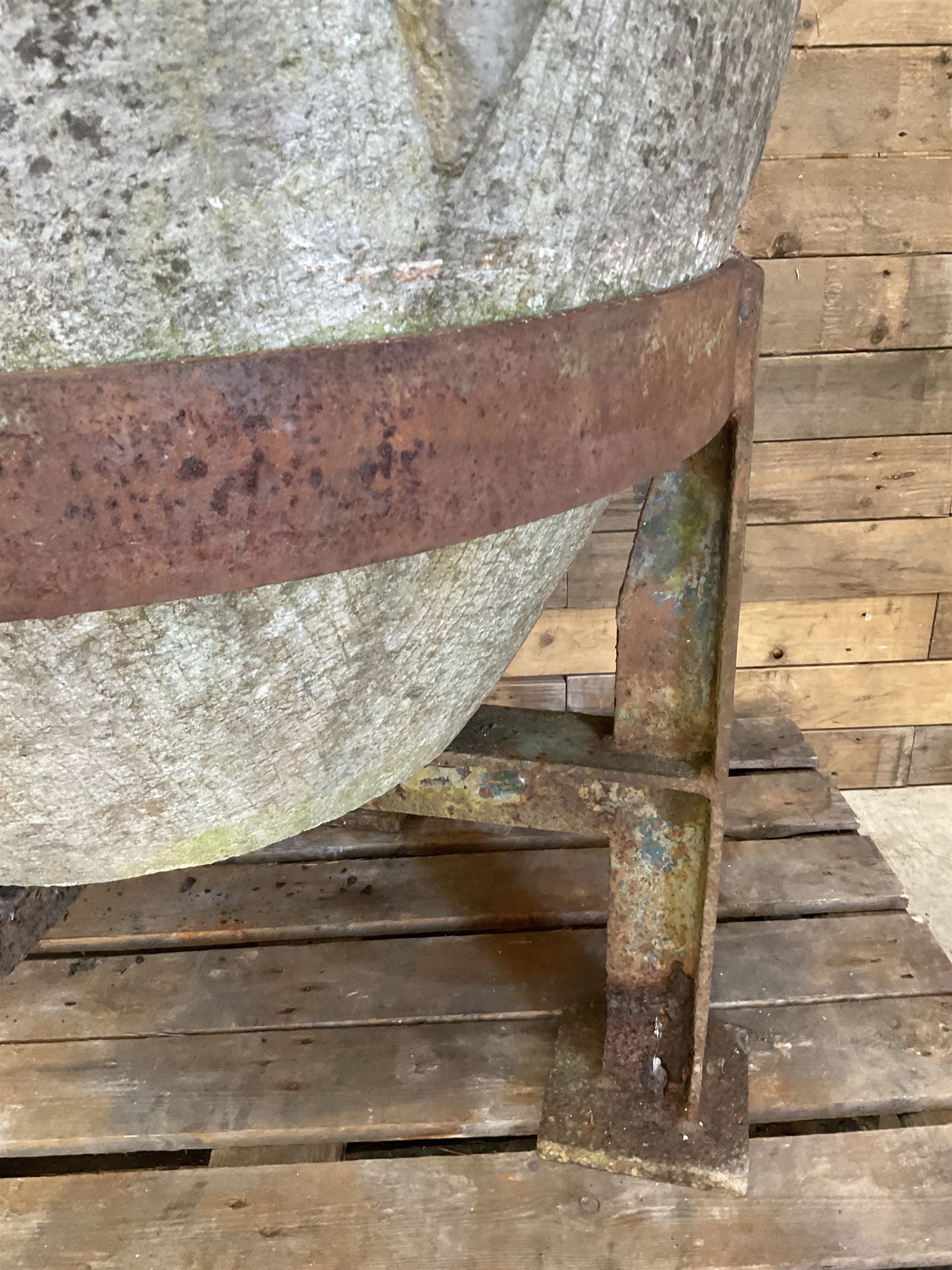Large 19th century circular stone mortar planter on wrought iron stand