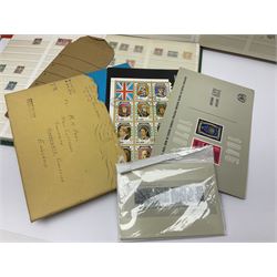 Great British and World stamps, including Queen Elizabeth II mint stamps in presentation packs, PHQ cards, Canada, Rhodesia and Nyasaland etc, in stockbooks and loose