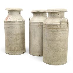20th century aluminium set of three milk churns, with handles, baring the stamps of 'Middlesborough Co-op', 'Holme Moor', 'Wholesale Dairies' 