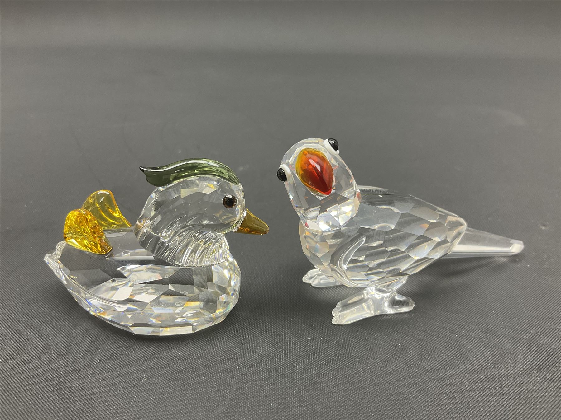 Fourteen Swarovski Crystal bird figures, to include toucan, mandarin duck, swans, parrot, cranes etc 