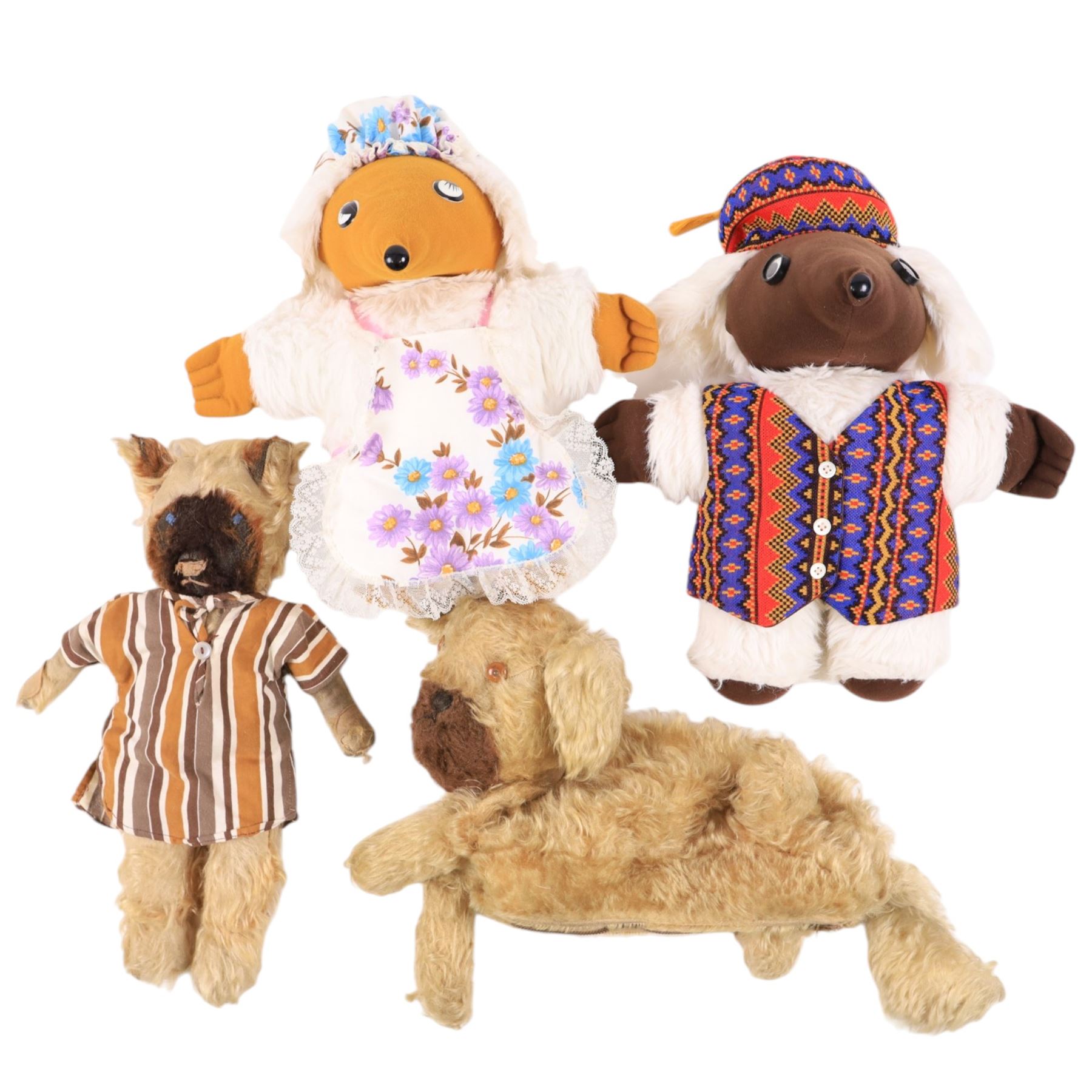 Four teddys including wombles, cat and dog