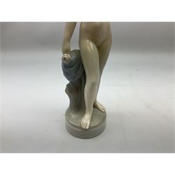 Royal Copenhagen 'Helena' figure modelled as a nude girl holding hand mirror, designed by Hans Hansen, model no. 4639, with printed and painted marks beneath, H25.5cm