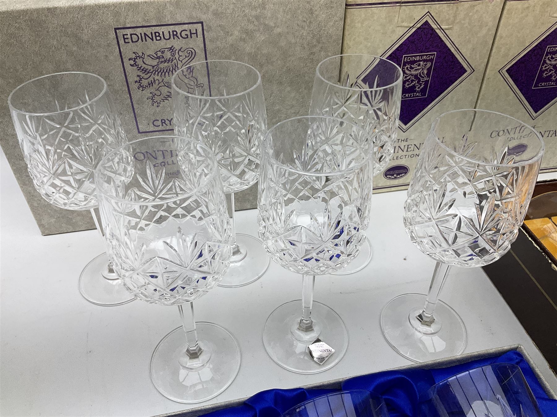 Set of six Edinburgh Crystal 'Continental' glass tumblers with original box, along with three boxed pairs of matching wine glasses and further boxed set of Cathedral Crystal glasses