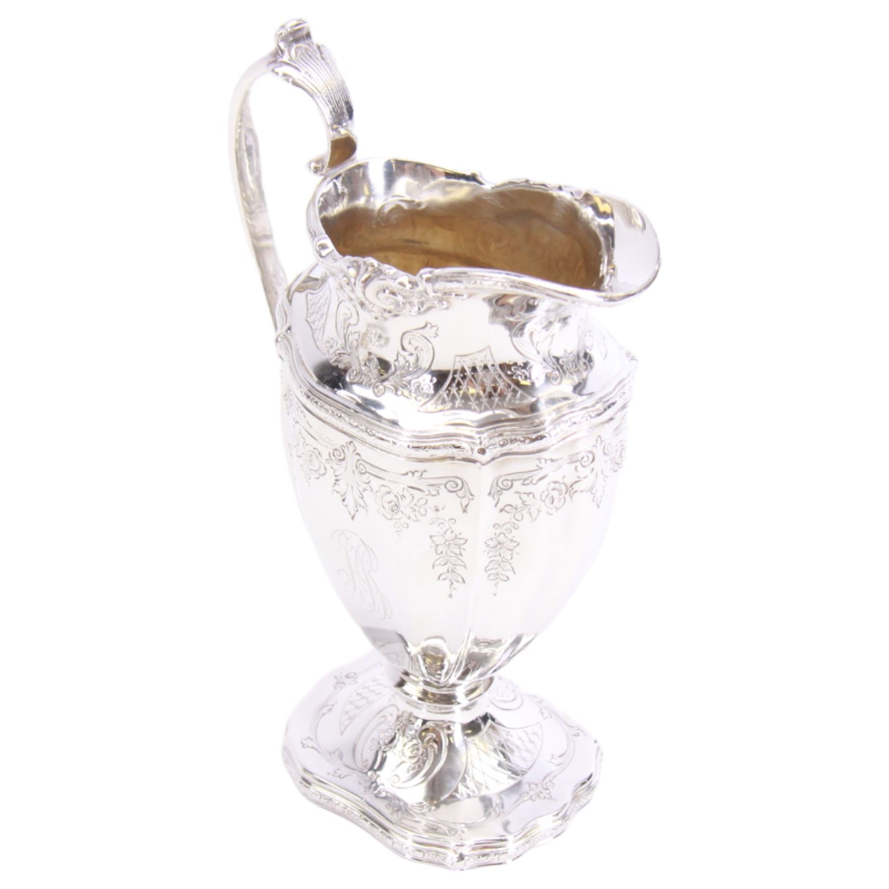 Early 20th century American silver three piece coffee service, comprising coffee pot with ivory insulators to the handle, twin handled sucrier, and cream jug, each of part reeded form chased with foliate swags and bands, each marked for Black, Starr & Frost, New York, also stamped Sterling, Chippendale Exclusive Design, coffee pot H27cm, including handles sucrier H12, including handle cream jug H15.5cm

This item has been registered for sale under Section 10 of the APHA Ivory Act