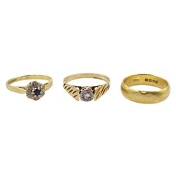 Gold sapphire and diamond cluster ring and wedding band, both 18ct and a 9ct gold single stone diamond ring, all hallmarked