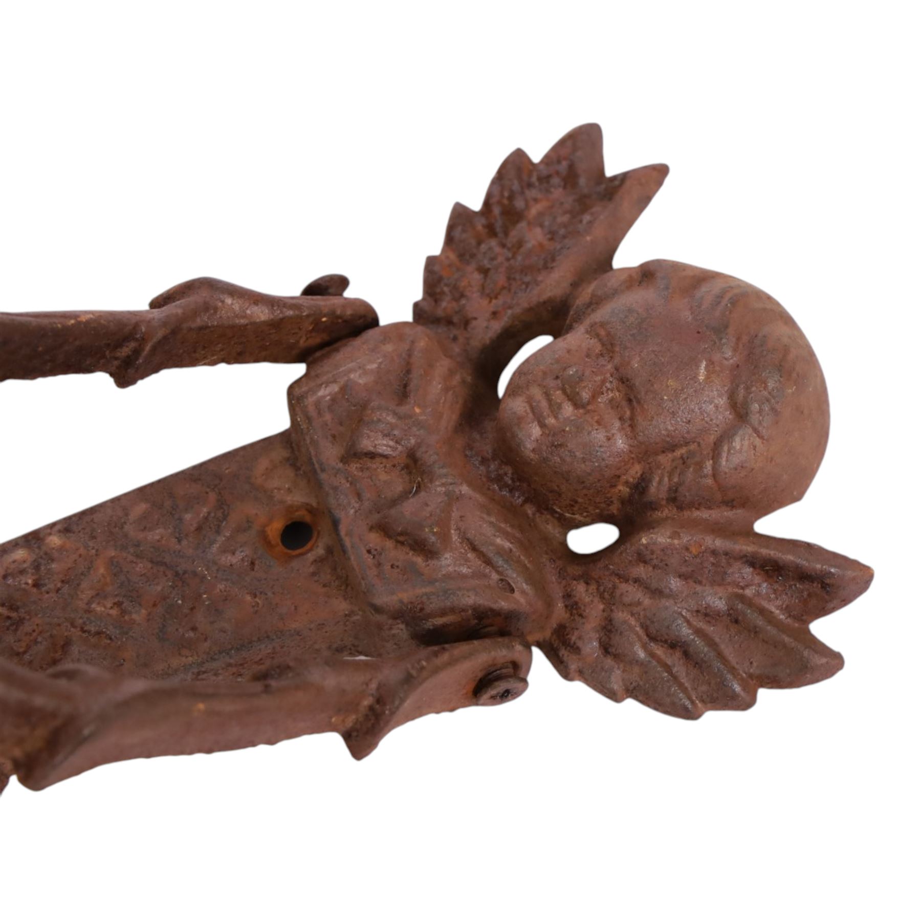 Cast Iron door knockers, surmounted with a chrub, H20cm 