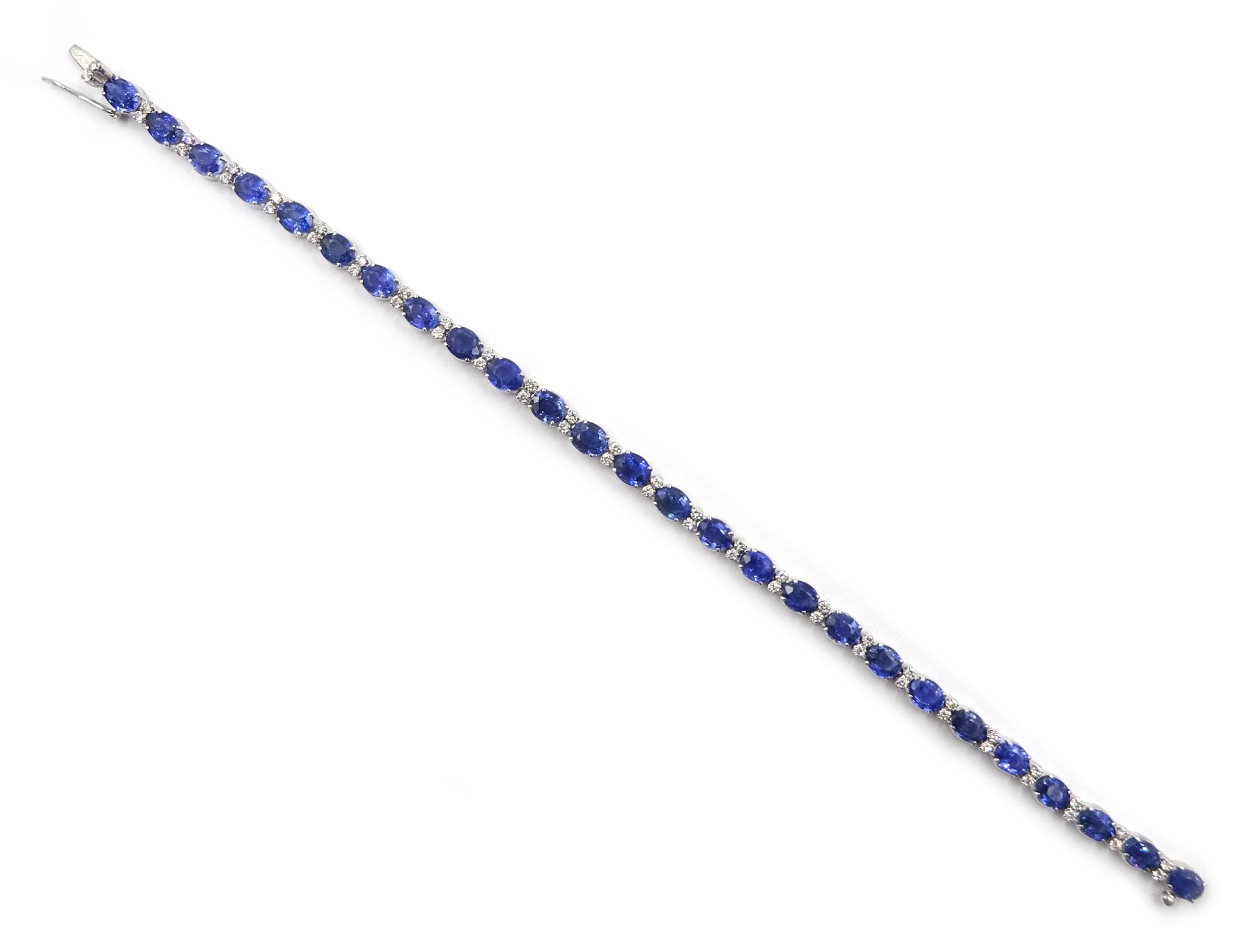 18ct white gold oval sapphire and diamond bracelet, stamped 750, total sapphire weight approx 12.00 carat