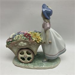 Lladro, Love’s Tender Tokens, modelled as a girl pushing a wheelbarrow full of flowers, no 6521, in original box