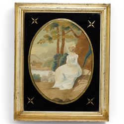 19th century oval woolwork picture of a girl in a garden landscape in verre eglomise frame...