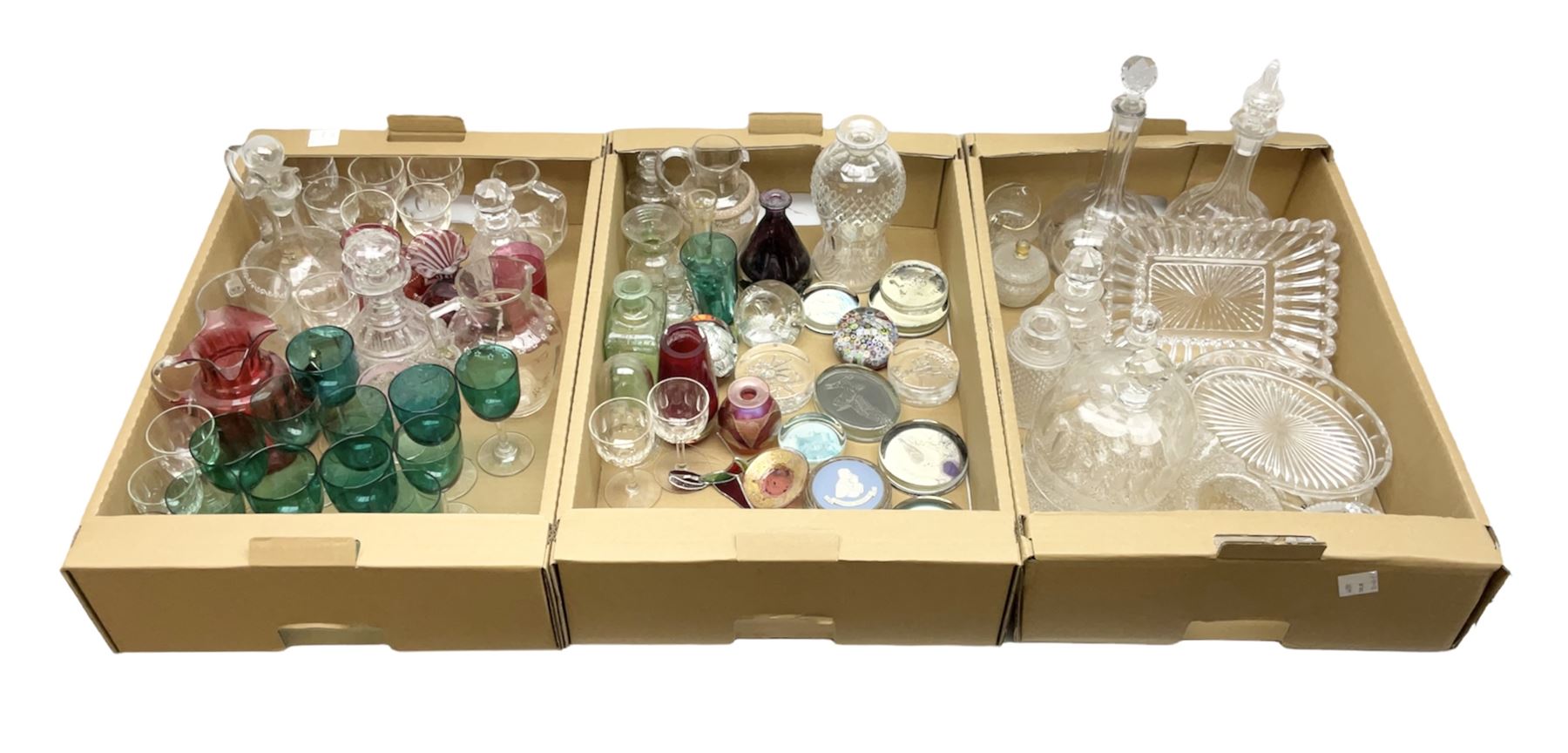 Millefiori paperweight, together with Caithness paperweight, Isle of Wight vase, cranberry glass tumblers, claret jug, decanters and other glassware, in three boxes 