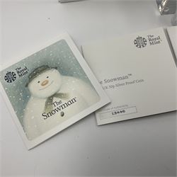 Four The Royal Mint United Kingdom 'The Snowman' silver proof fifty pence coins, comprising 2018, 2018 in PCGS holder, 2019 and 2022 'The Snowman and The Snowdog', all cased with certificates 