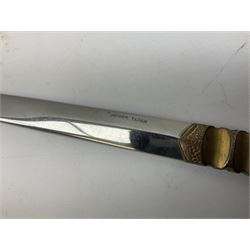 Malayan Kris dagger, the 31.5cm double edged straight heavy damascus blade with copper ferrule; carved hardwood grip; in large wooden throated scabbard with floral decorated white metal covering L47.5cm overall; a kris blade with adapted antler grip; and five various small daggers/letter openers (7)
