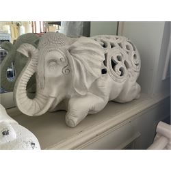 Three cast seated Buddhas and an elephant (4)- LOT SUBJECT TO VAT ON THE HAMMER PRICE - To be collected by appointment from The Ambassador Hotel, 36-38 Esplanade, Scarborough YO11 2AY. ALL GOODS MUST BE REMOVED BY WEDNESDAY 15TH JUNE.