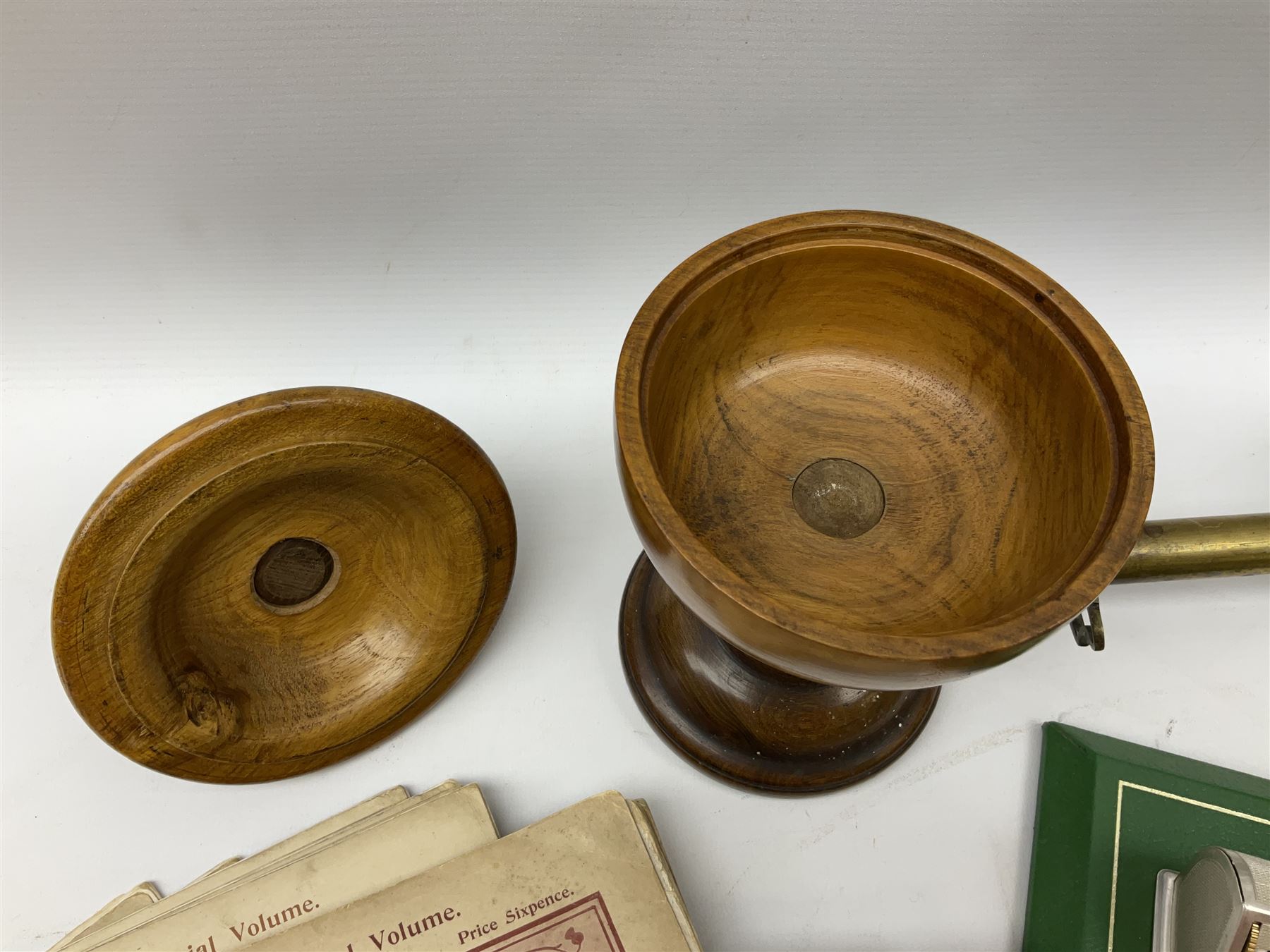 Olive wood lidded urn/vase, brass inkwell, Art Deco style perpetual desk calendar, leather bound Chesterman tape measure, brass roasting spit, Punch Magazines etc