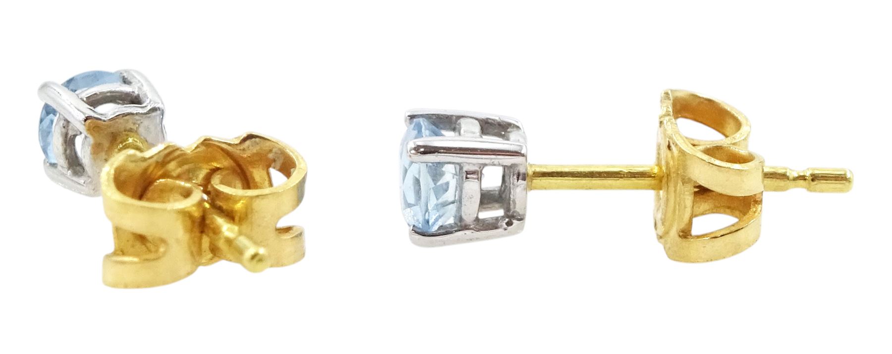 Pair of 18ct gold round cut  aquamarine stud earrings, hallmarked
