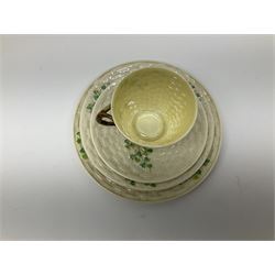 Two Royal Crown Derby pattern Imari soup bowls, pattern 2451, Belleek Fermanagh Ireland four piece set in green shamrock pattern, Royal Doulton small lady figure, Marie HN1370, large Wedgwood fruit bowl, Sylvac jardiniere in autumn leaves pattern, five pieces Co-operative Society commemorative ceramics, with selection of other ceramics. 