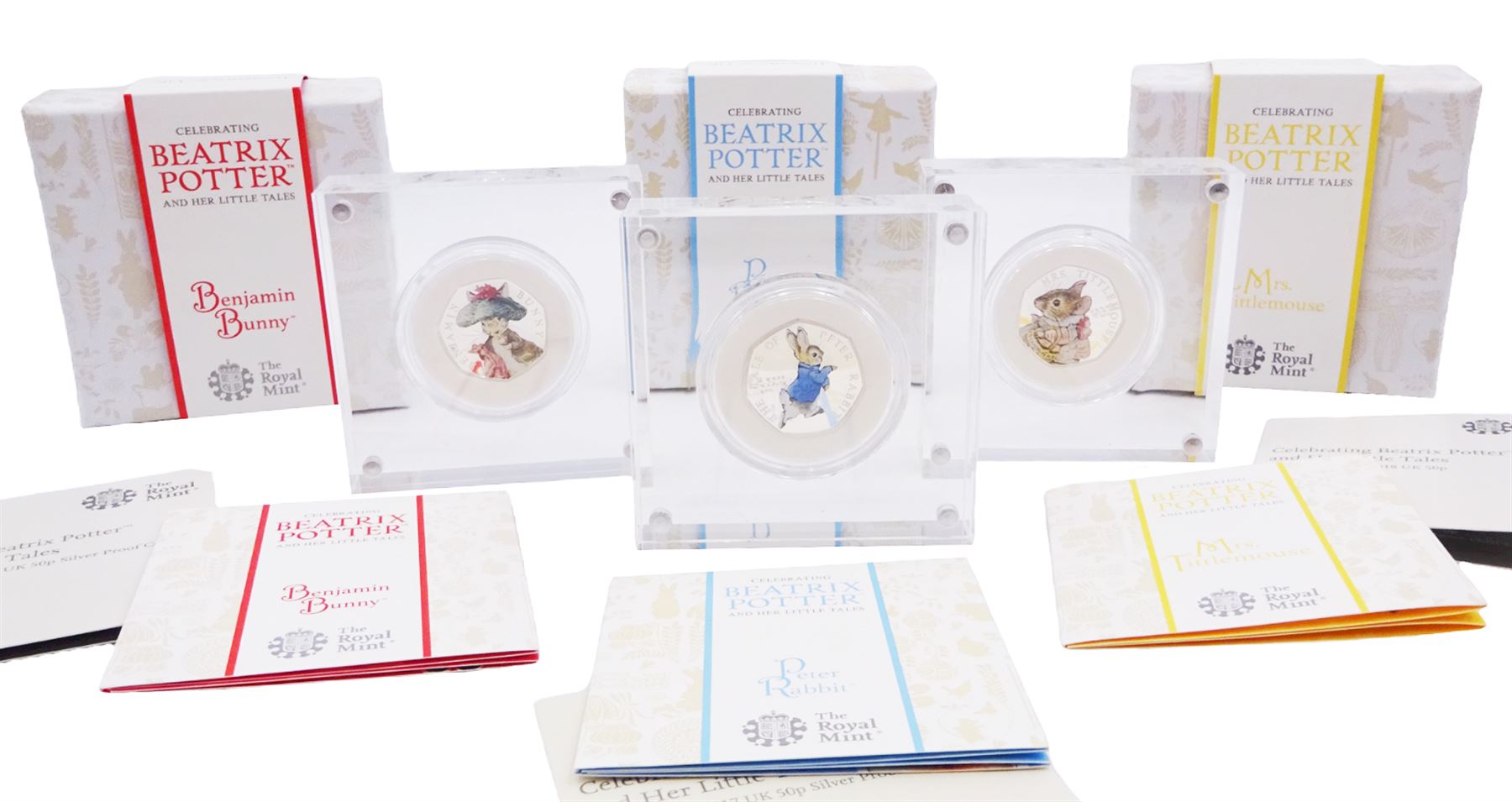 Three The Royal Mint United Kingdom Beatrix Potter silver proof fifty pence coins, 'Benjamin Bunny', 'Mrs Tittlemouse' and 'Peter Rabbit' all cased with certificates