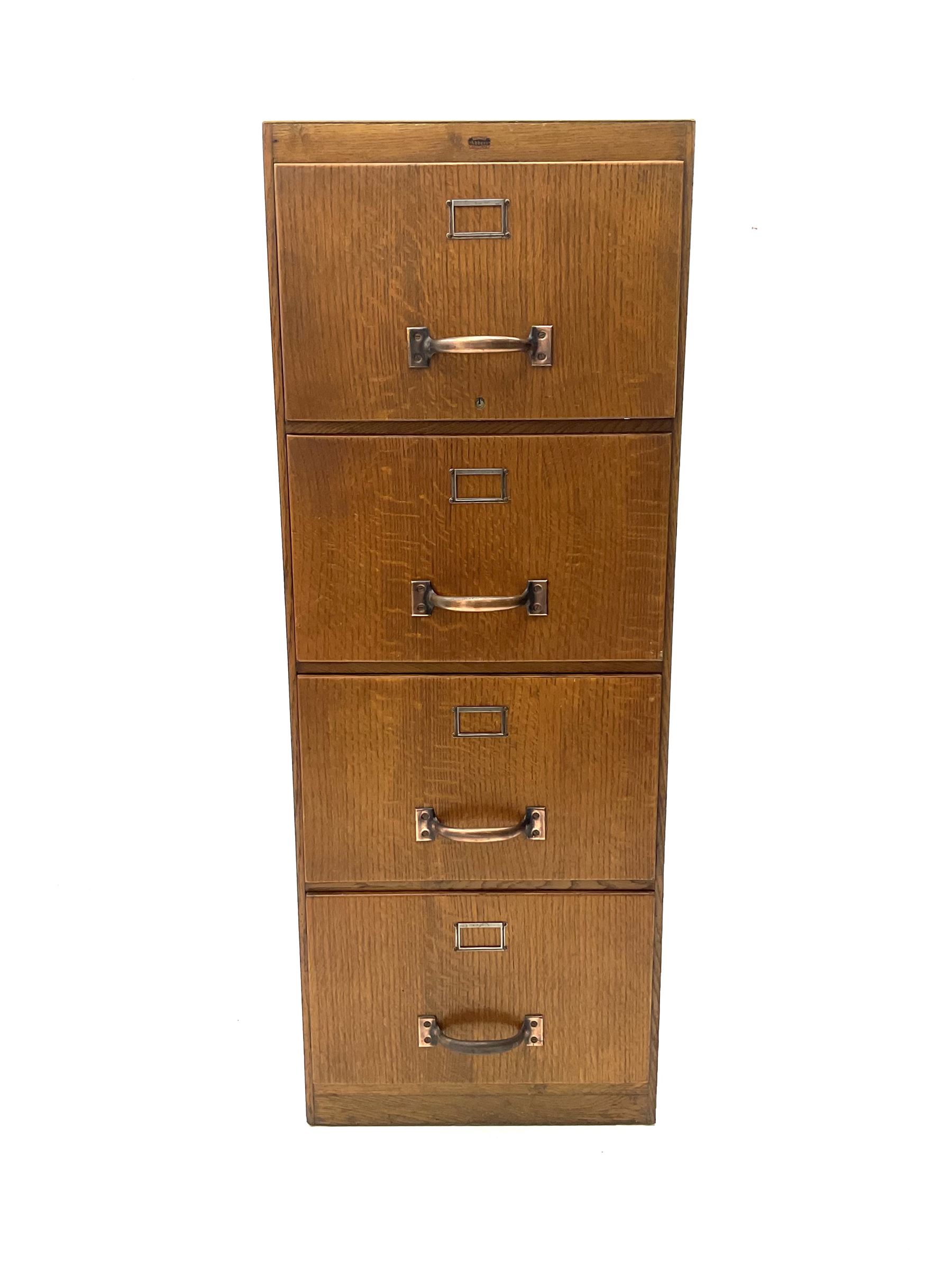 Vintage oak filing cabinet, fitted with four deep drawers 