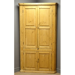  18th century country pine corner cupboard, four panelled doors, W110cm, H194cm, D54cm  