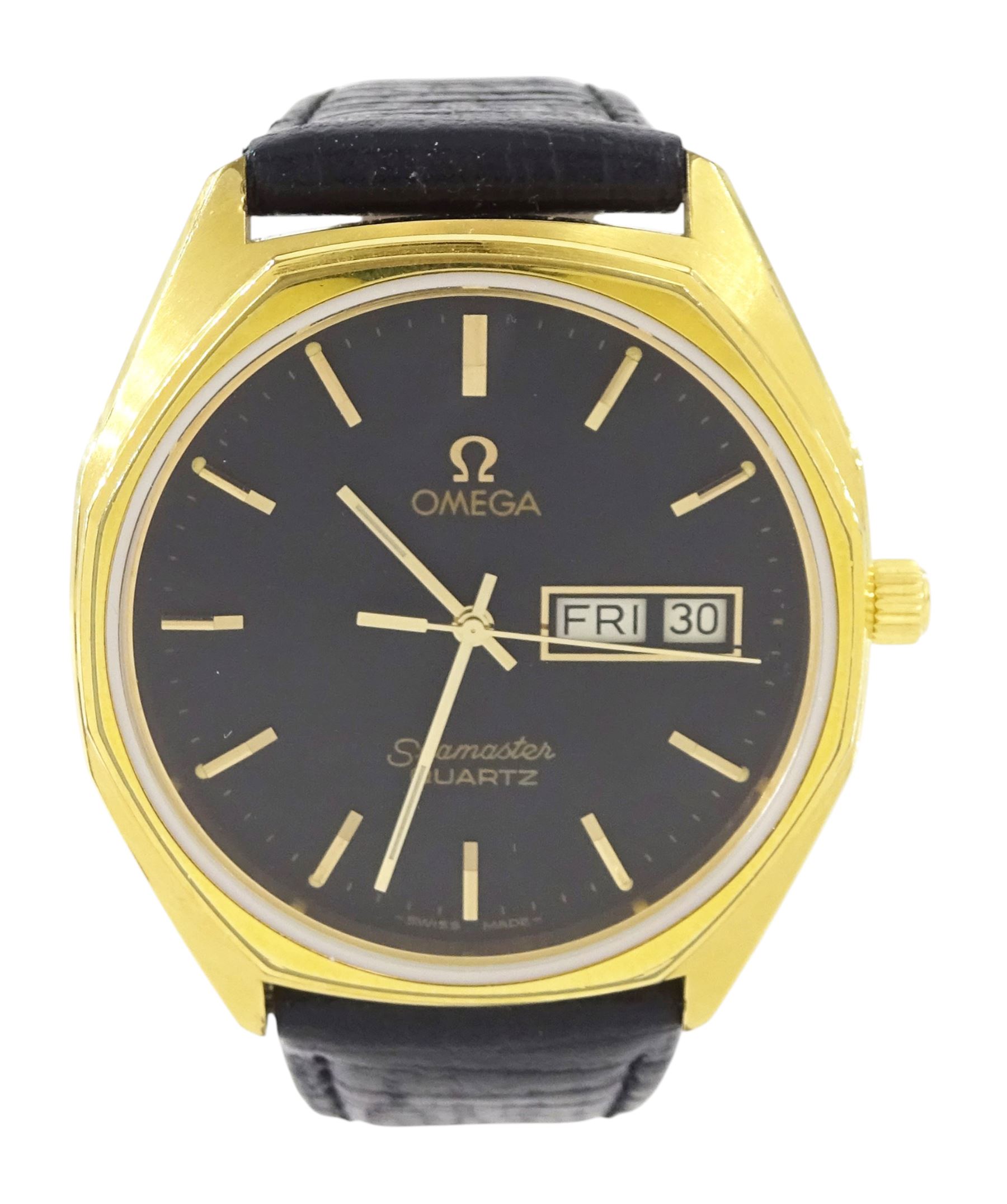 Omega Seamaster gentleman's gold-plated and stainless steel quartz wristwatch, Ref. 196.0126, Cal. 1345, black dial with baton hour markers and day - date aperture, on Omega black leather strap with buckle, boxed with Omega repair receipt dated 2023