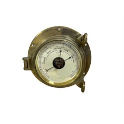 20th century Nauticalia aneroid barometer and a 1950’s hanging wall clock in a rectangular mahogany case, spring wound and set from the rear.
