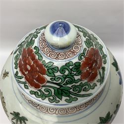 19th century Chinese Wucai vase and cover, decorated  with peacock on blue rockwork and other birds flying amongst tree peonies, H43cm