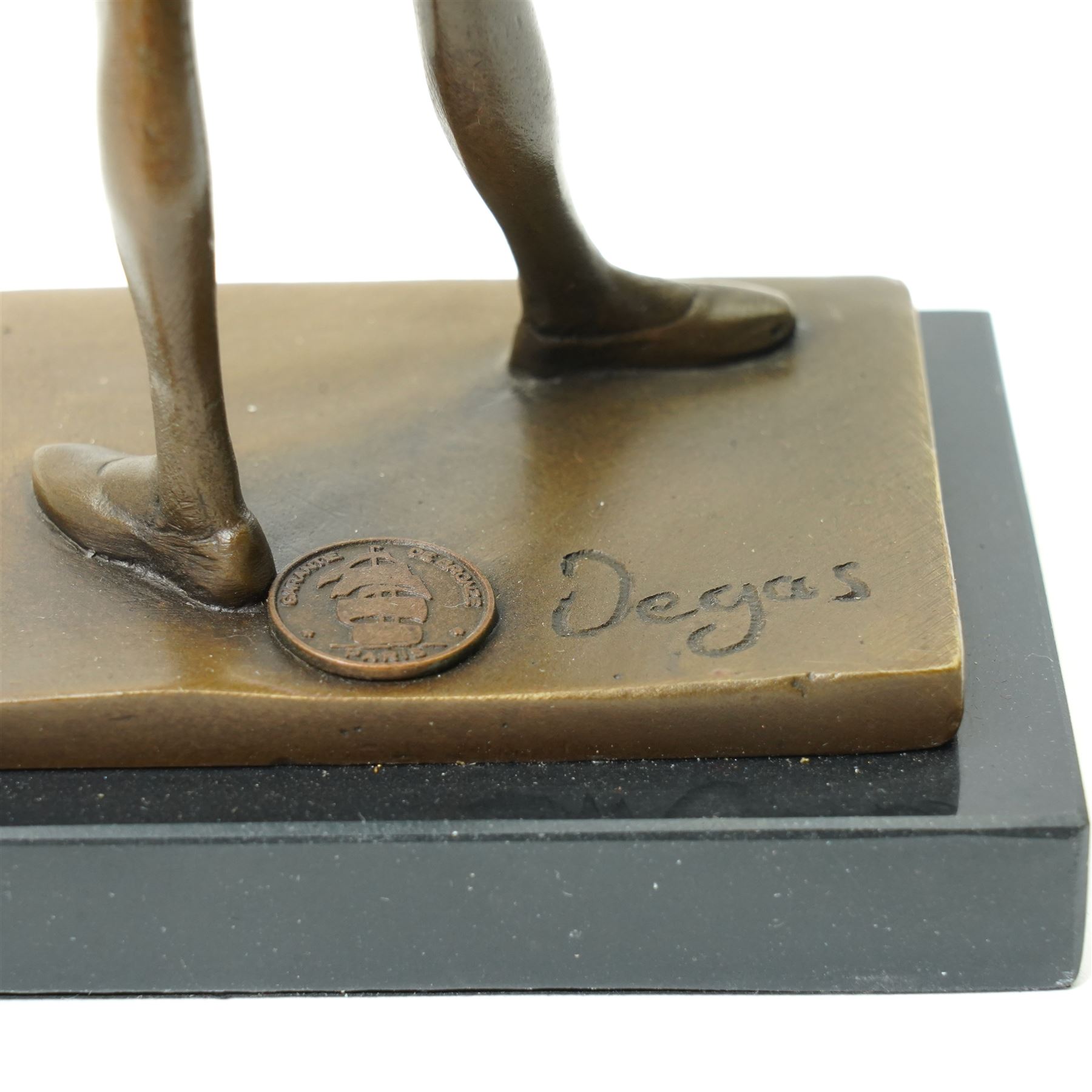 After Edgar Degas, (1834-1917), La Petite Danseuse de Quatorze Ans, small bronze figure modelled as a young female dancer, on rectangular black marble base, H18.5cm