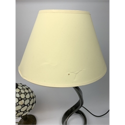 A small Tiffany style table lamp, with leaded glass shade, overall H38cm, together with another table lamp with curved metal base and cream shade, overall H66cm. 