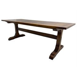 Dorset Oak - large refectory dining table, rectangular plank top, raised on shaped end supports with sledge feet, united by stretcher