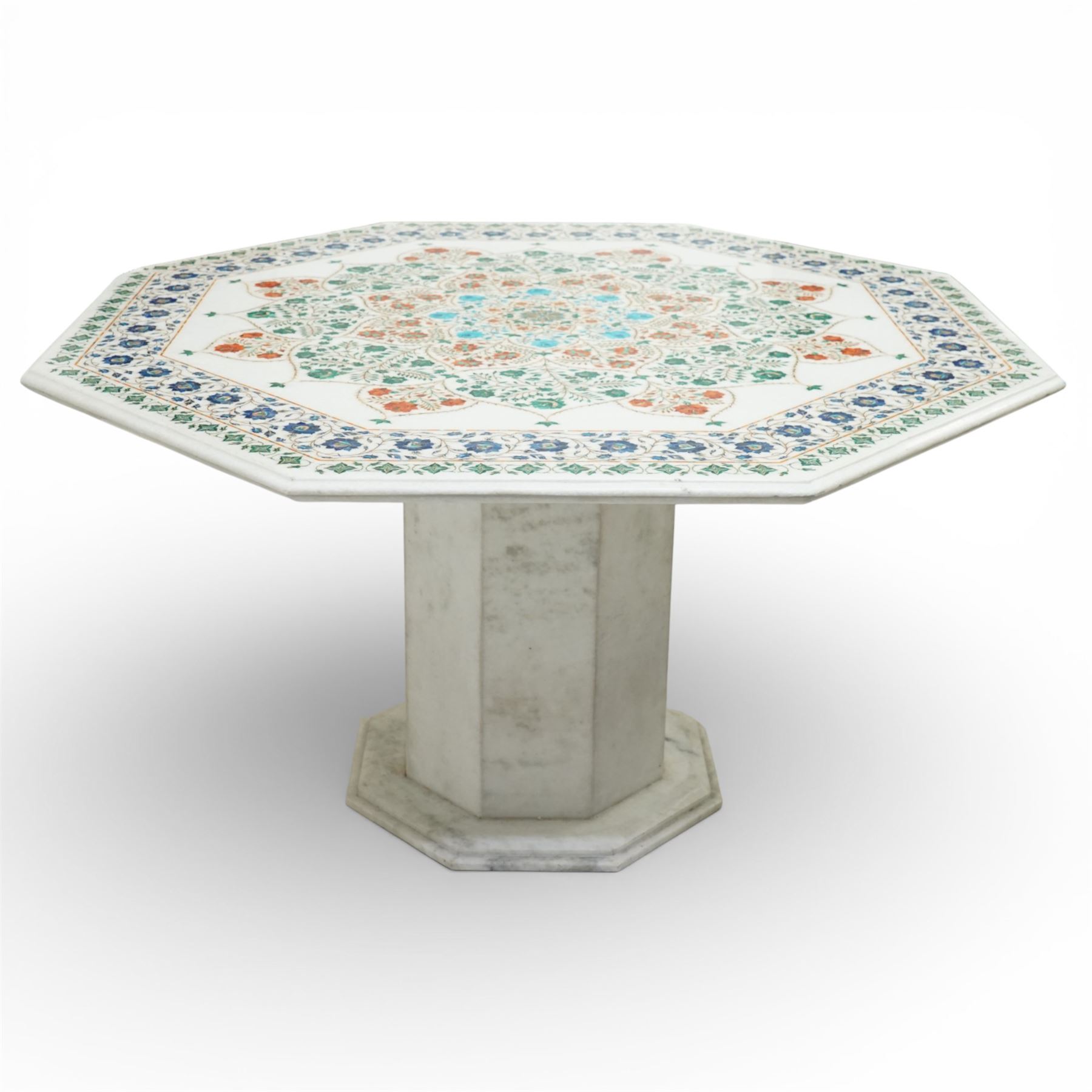 20th century Florentine design composite marble pietra dura centre table, octagonal white marble top inlaid with a polychrome foliate and floral medallion centred by a rosette, within a conforming floral border, raised on a faceted octagonal marble pedestal and stepped base