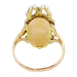 19th century gold and silver diamond portrait ring, set with an oval miniature of a woman on ivory, under a glazed panel, with rose cut diamond bow and floral sprigs below, to trifuricated shoulders. This lot has been registered for sale under Section 10 of the APHA Ivory Act