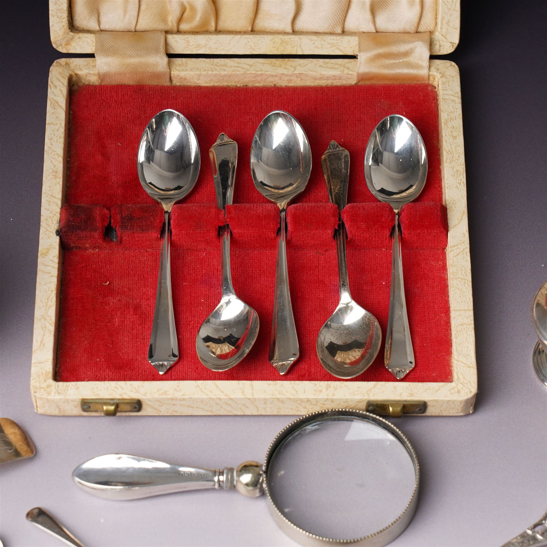 Silver three piece condiment set London 1973-1976 Maker C J Vander Ltd, George III silver sauce ladle London 1798, five silver coffee spoons, Dutch pierced silver server, silver handled knife, silver handled magnifying glass and small silver dish