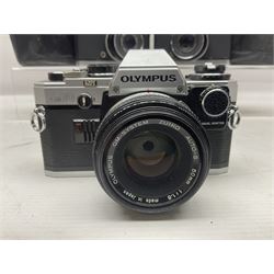 Four Olympus camera bodies, including Olympus OM10, serial no 20744269, with 'Olympus OM-System Zuiko Auto-S 50mm 1:1.8' lens serial no 3633644, Olympus OM-2 camera body serial no 460280 with 'Olympus OM-System G.Zuiko Auto-s 1:1.4 f=50mm' lens, serial no 729750, etc 