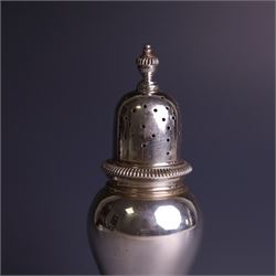Mid 20th century silver sugar shaker, of typical baluster form, the removable pierced cover with urn finial, hallmarked William Comyns & Sons Ltd, London 1961