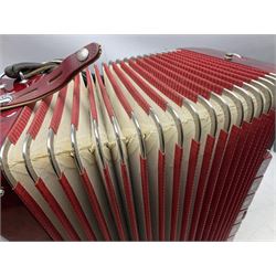 Clinkscale Crucianelli piano accordion in red pearline case with one-hundred and twenty buttons and forty-one keys L52cm; in carrying case