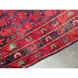 Persian Karajeh rug, the blue ground field decorated with Boteh type motifs, three band border each decorated with stylised flower heads  