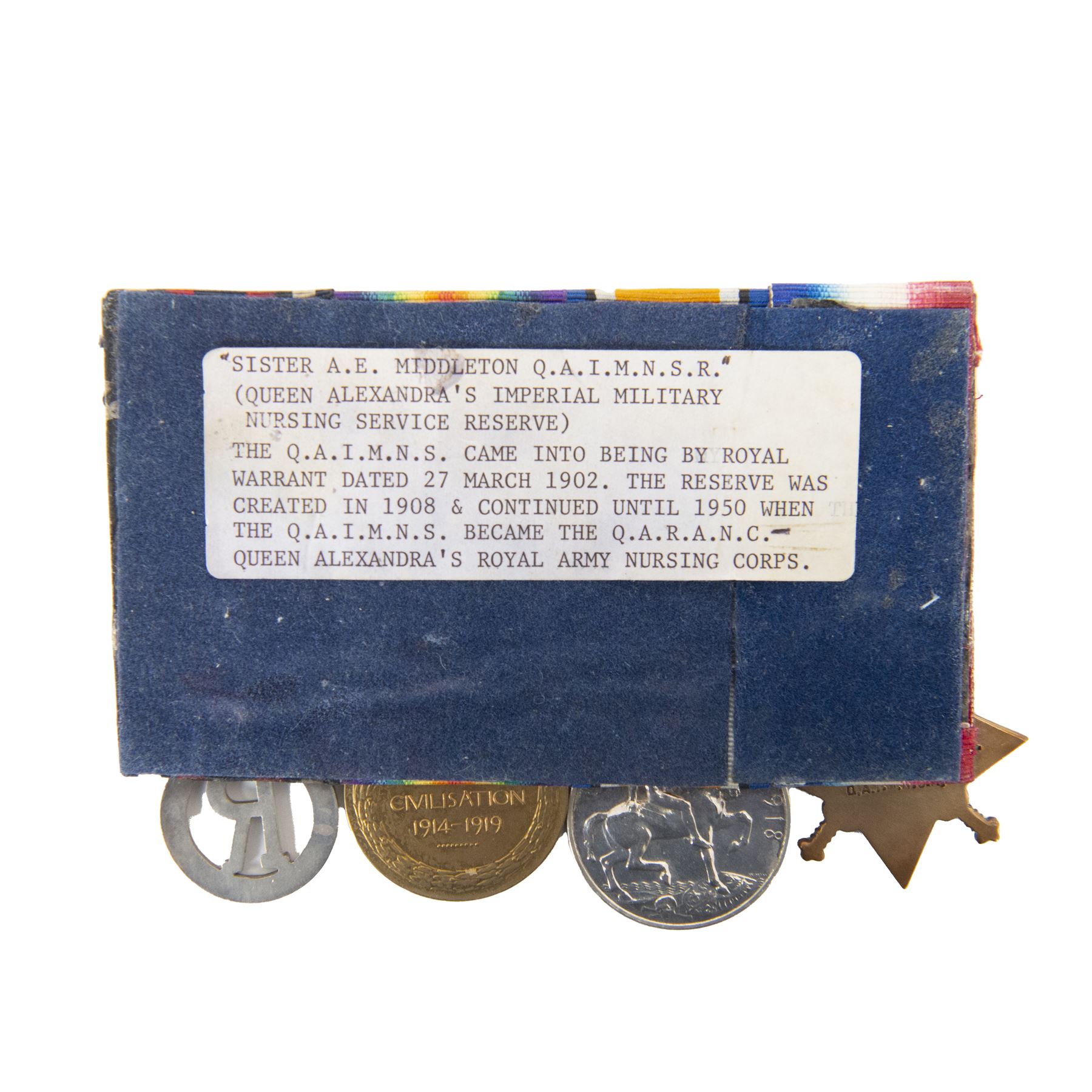 WWI medal trio awarded to female recipient; 1914-15 Star, War Medal and Victory Medal, together with Queen Alexandra’s Imperial Military Nursing Service Reserve cape badge, awarded to Sister A.E. Middleton Q.A.I.M.N.S.R 