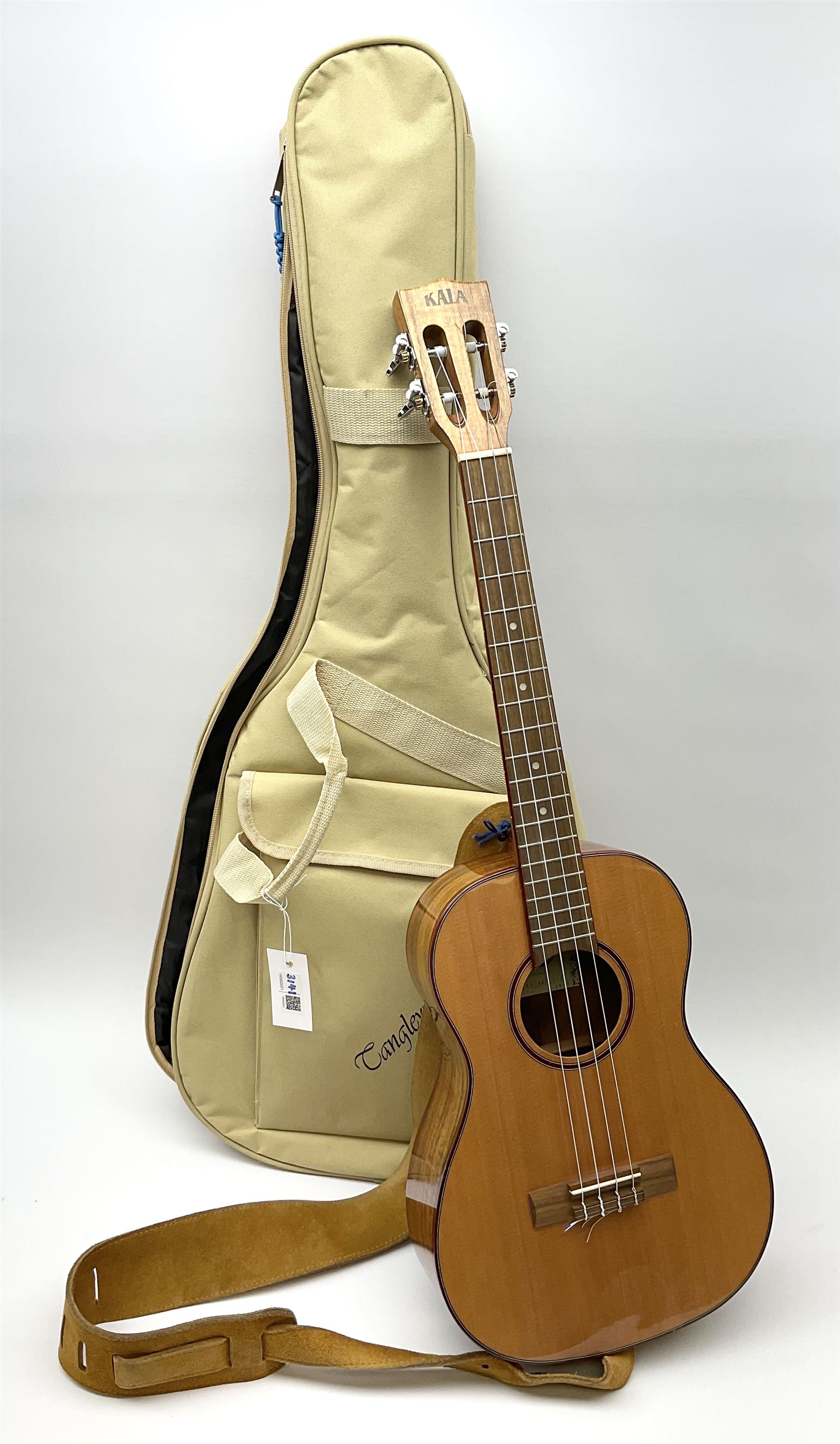 Modern Kala ukulele with acacia back and sides, spruce top and mahogany neck with slotted headstock No. KA-ABP-CTG 1801 L76cm in Tanglewood carrying case; and PG-05 Portable 5W Guitar Amplifier (Battery), boxed (2)
