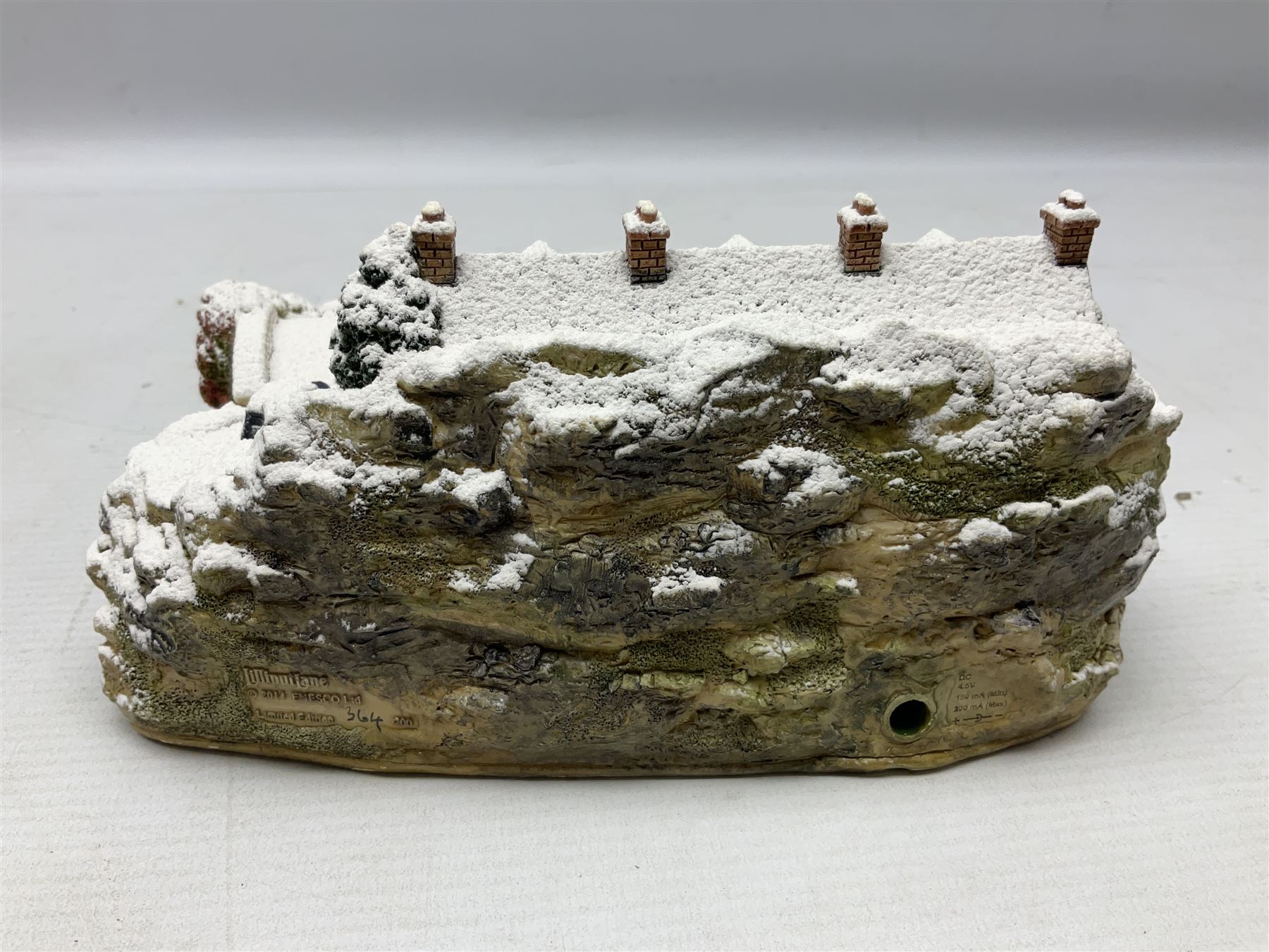 Five Lilliput Lane Illuminated Cottages, comprising Christmas is Coming, with box and deed, Christmas at Mol's, with box and deed, Christmas in Canterbury, with box and deed, Christmas Lights at Sweet Delights and The Three Kings, with box and deeds, together with twelve other Lilliput lanes, to include The First Noel, with box and deed, Winters Moonlight, Yuletide treats, with box and deed etc (17)