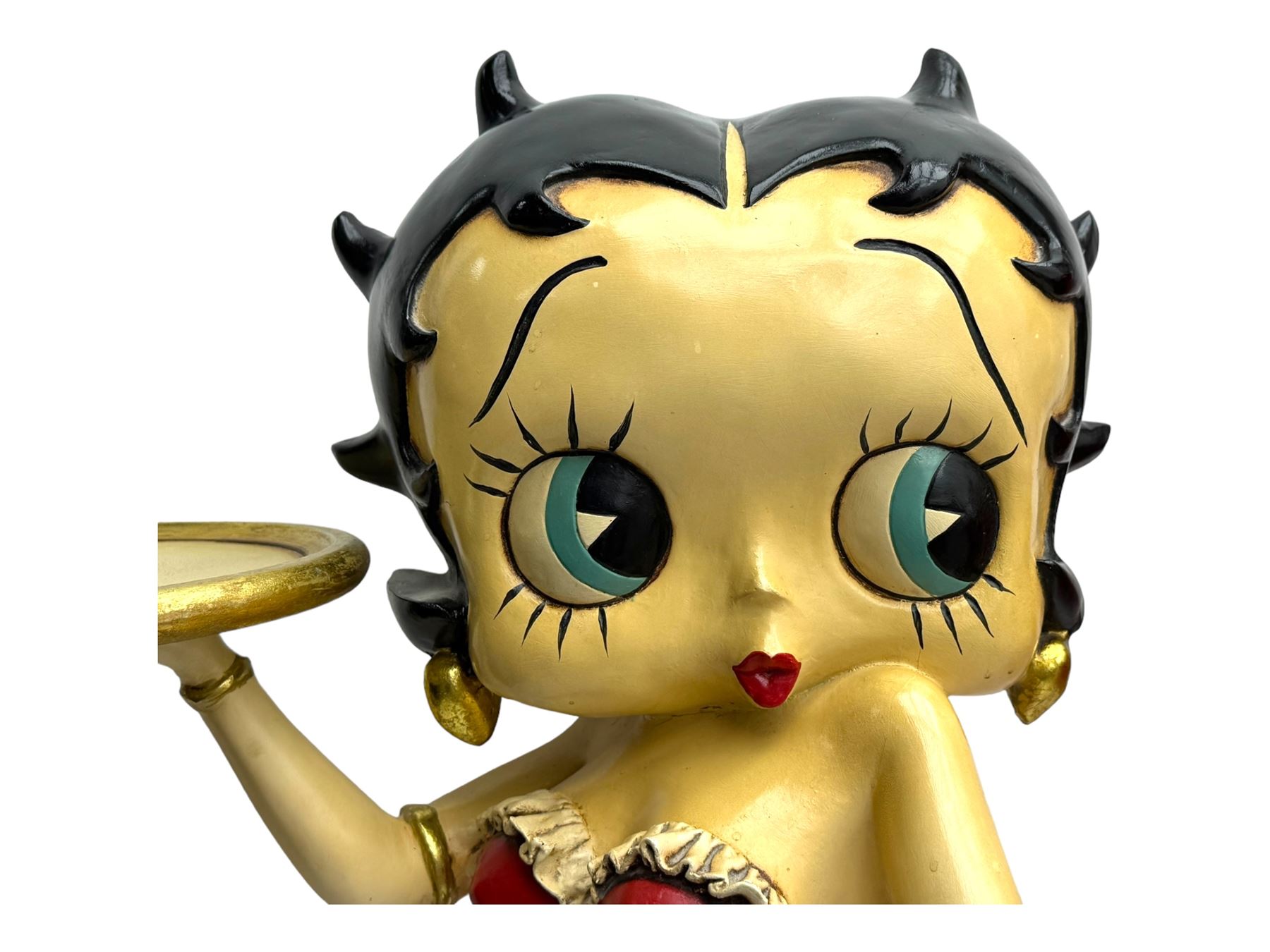 Contemporary Betty Boop waitress figure, modelled standing with one hand holding a circular tray, dressed in a red dress with gold accents, on a black circular base
