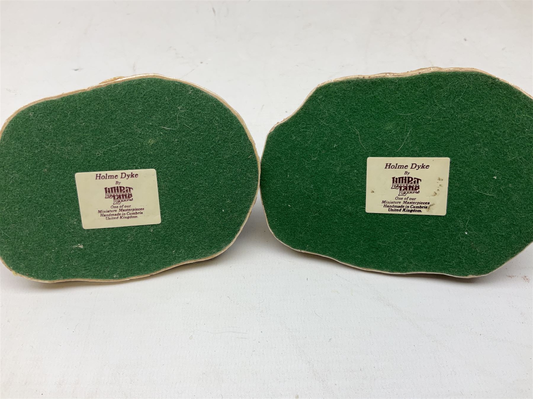 Twenty six Lilliput Lane models from the British and English Collections to include 'Ostlers Keep', 'Holme Dyke', 'Dovetails', 'Victoria cottage' etc, all boxed with deeds