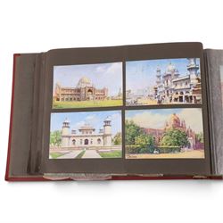 Two early to mid 20th century postcard albums, containing black and white and colour postcards, the first labelled Meine Reisen in Indien containing postcards of Arabia, India, Egypt, some personal photographs and newspaper clippings, of postcards, the second labelled Meine Reisen in England, containing mostly postcards of London, some greetings cards etc
