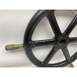 Brass bound teak ship's wheel with six turned spokes and brass hub, together with metal ship's wheel with six spokes, painted black with gilt spokes, largest D53cm