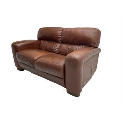 Three seat sofa upholstered in chocolate brown leather, and matching two seater sofa