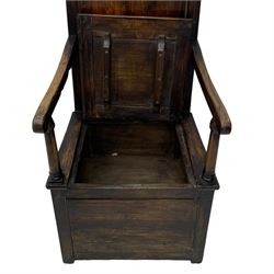 18th century elm box-seat lambing chair, dished cresting rail over panelled back, panelled hinged lid flanked by two turned arm supports