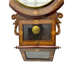 An American 'New Haven' late-19th century wall clock in a Rosewood case with parquetry inlay, carved 'ears' flanking the glazed pendulum viewing door with a glazed sloping base beneath, 12