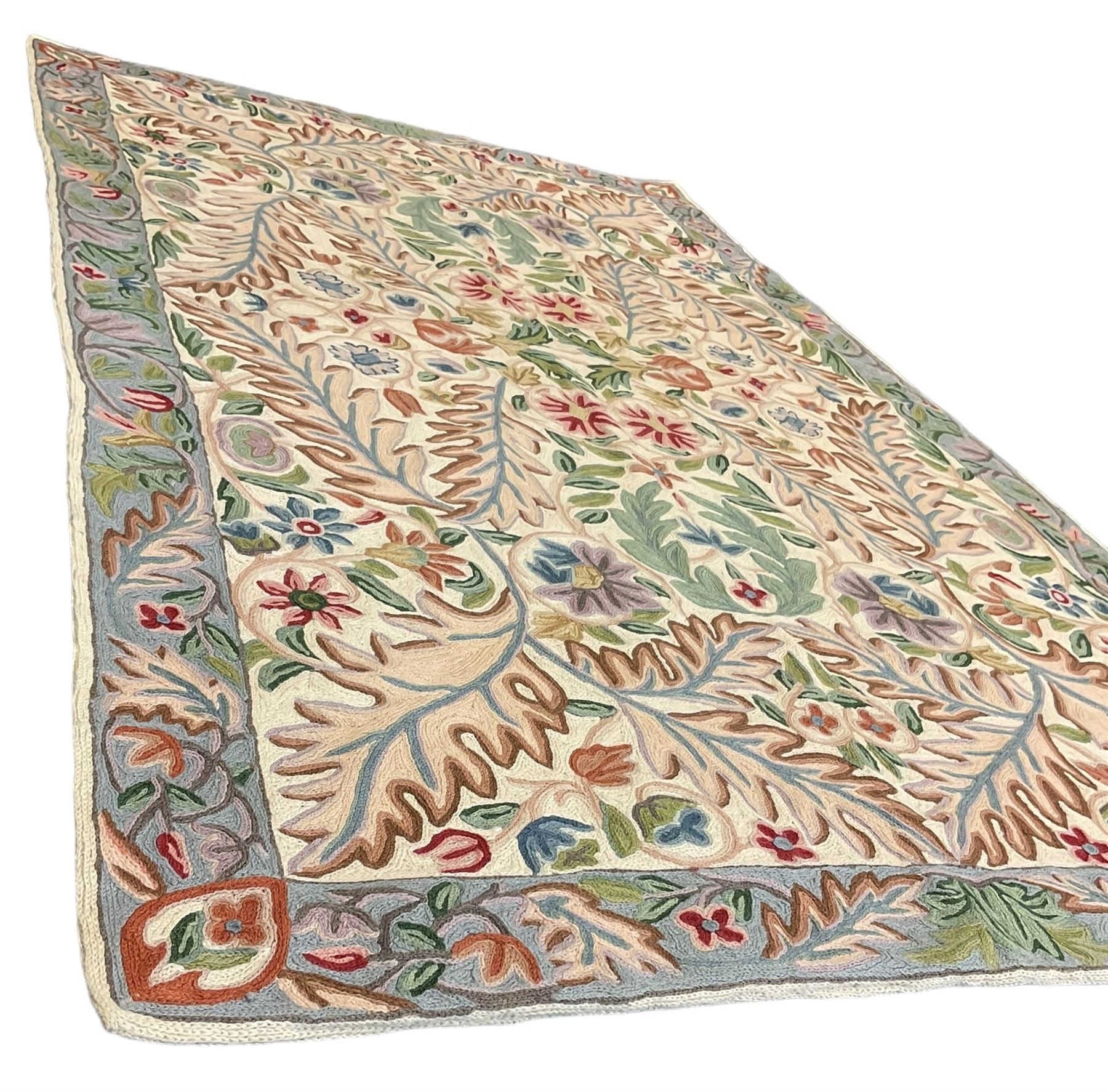 Crewel work wool chain wall hanging or rug, decorated with leaves and flower heads, the border with trailing floral pattern
