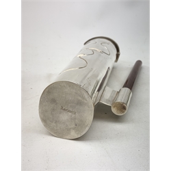 A silver plated Ravissant water jug, of cylindrical form with wooden open handle, detailed with a group of vases, marked beneath Ravissant, H25.5cm.  
