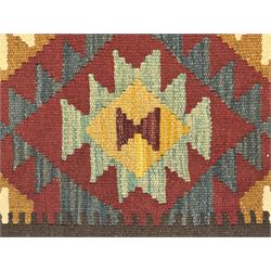 Maimana Kilim ground runner, multicoloured geometric medallions arranged in rows, with triangular motifs in the field, the wide border in brown with contrasting guard bands